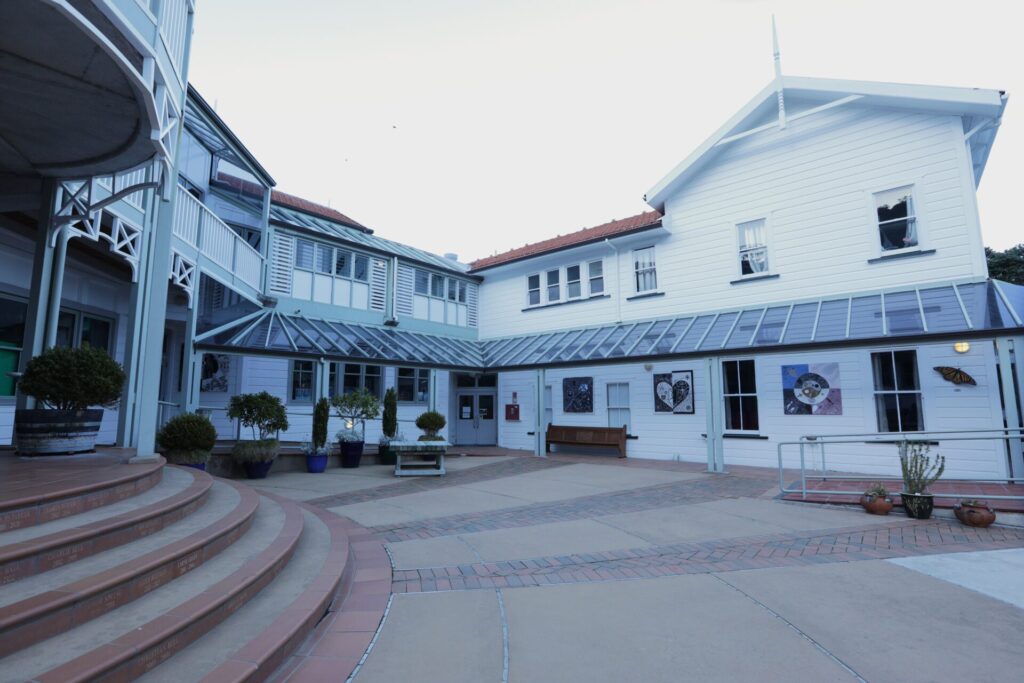 Wellesley College inner quad with surrounding school buildings, featuring paved pathways and bricks